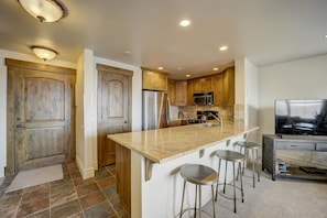 Breakfast bar and kitchen with all updated appliances