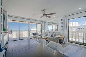 6 Person dining table with views of the beach and sunset. 2 Walk-out decks.