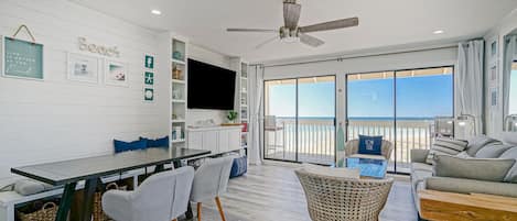 Beachfront location! Living room with the beach views. Faces sunset! 