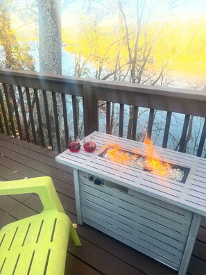 fire table next to the hot tub