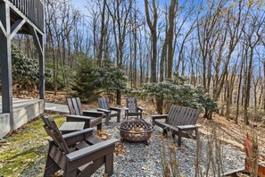 Wood Burning Fire Pit with Seating in Front of the House