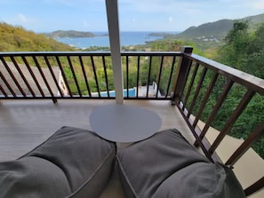 The view of the bay and sitting area from the balcony in the bedroom