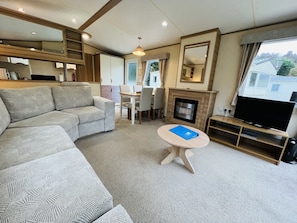 The open-plan living area in our luxury holiday caravan, Shanklin, Isle of Wight