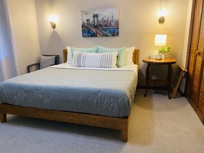 Bedroom #1: King bed with ceiling fan and UHD smart TV