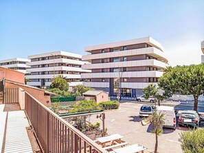 Building, Car, Sky, Plant, Vehicle, Tower Block, Urban Design, Condominium, Neighbourhood, Tree