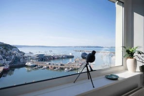 Watch the harbour in action with the spotting scope!