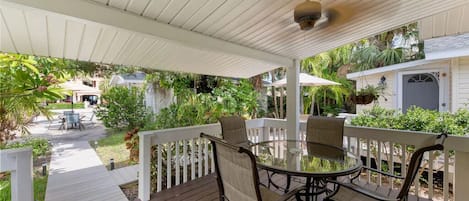 Large open porch. Nice place to relax after a day on the beach