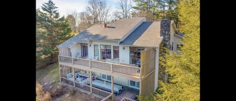 Lots of room to relax with views of the lake across a gently sloping lawn!