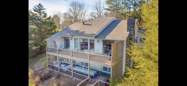 Lots of room to relax with views of the lake across a gently sloping lawn!