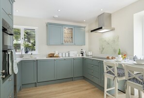 Ground floor: Well-equipped and stylish kitchen