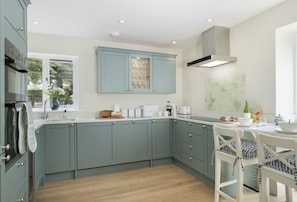 Ground floor: Well-equipped and stylish kitchen