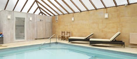 Enjoy access to the heated indoor swimming pool and steam room at Cats Abbey Cottage