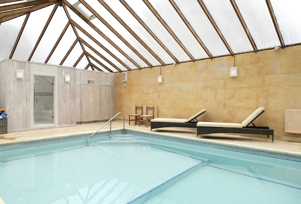 Enjoy access to the heated indoor swimming pool and steam room at Cats Abbey Cottage