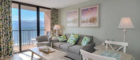 Beach Colony 903 offers a  gorgeous oceanfront view from the living room.