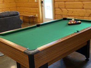 Anyone up for a round of pool? 6' Mizerak pool table waiting for your best shots