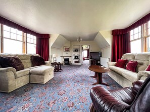 Living room | Fourpenny Cottage - Fourpenny Cottages, Skelbo, near Dornoch