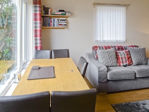 Charming dining room with seating area | Elm Bank, Lochcarron, near Wester Ross