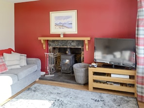 Attractive living room with wood-burning stove | Elm Bank, Lochcarron, near Wester Ross