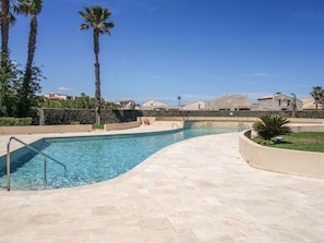 Sky, Water, Plant, Azure, Swimming Pool, Tree, Arecales, Body Of Water, Shade, Leisure