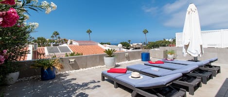 Sun loungers on terrace