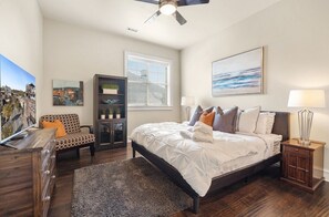 Our cozy Master Bedroom is complete with a King bed, Smart TV, storage, and a private bath.