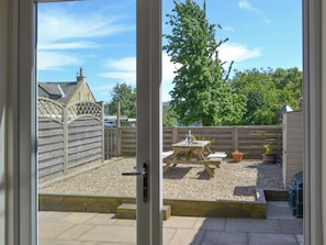 Patio doors from the living room | Dolly’s Cottage, Ovington
