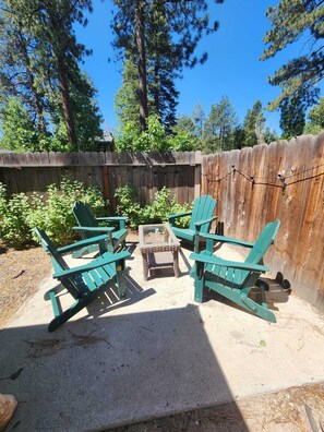 Adirondack chairs to relax in the backyard