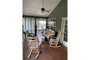 Screened porch is always shaded. A great place to relax when not on the water.