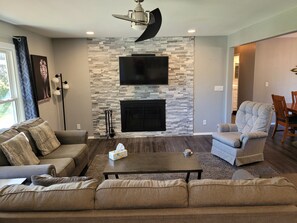 Living Room facing fireplace and tv