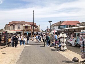 Sky, Town, Public Space, Street, Pole, Leisure, Shade, Crowd