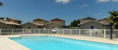 Water, Sky, Cloud, Swimming Pool, Building, Plant, Azure, Shade, Tree, Architecture