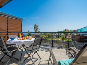 Sky, Table, Furniture, Chair, Shade, Outdoor Furniture, Outdoor Table, Leisure, Plant, Landscape