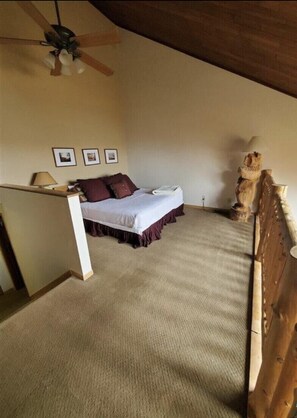 Loft Area Bedroom with Skylight View of Lake Superior and King Size Bed