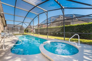 Pool and in ground spa showing the assistance bars to ease getting in out.