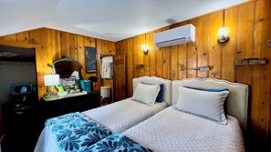 Downstairs separate studio with in room Air con to keep cool during the summer months; has private en suite bathroom & shower.