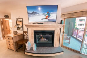 Enjoy the gas fireplace and large TV