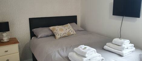 Double bed with towels and linen included. Smart HD TV with free Wi-Fi.