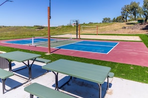 Play games on your private sports court and beach volleyball court.
