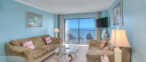 This oceanfront living room is the perfect place to relax with loved ones.