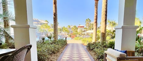 Walk DIRECTLY out to the gorgeous lagoon pool and beautiful landscaping. 
