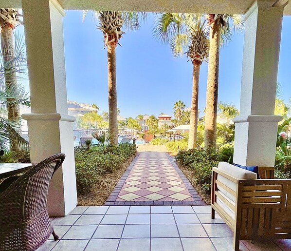 Walk DIRECTLY out to the gorgeous lagoon pool and beautiful landscaping. 