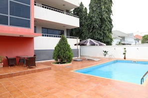 Awesome pool and outdoor chilling area. Includes huge umbrella! Pool is 5ft deep