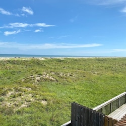Beach view to the right of the house