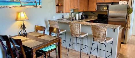 A dining area and a kitchen bar