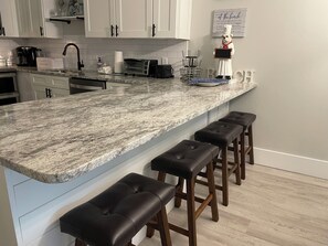 Bar area of the kitchen with stools