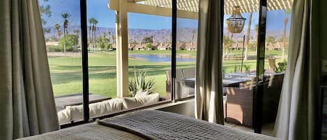 Amazing view of the 7th fairway, lake and mountains from primary bedroom