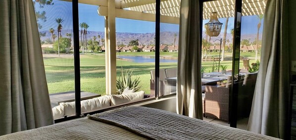 Amazing view of the 7th fairway, lake and mountains from primary bedroom