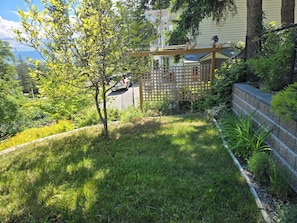 Small private grass patch next to the patio.