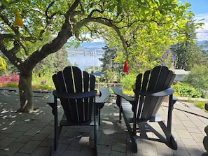 Private patio in the front of the entrance and a view from it