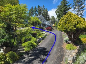 Drive leads to the large parking on the left just bellow the entrance